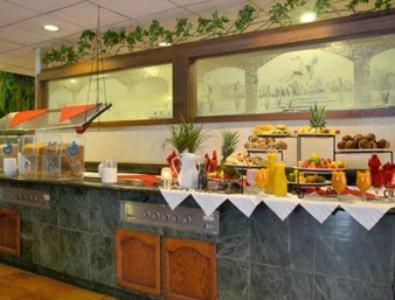 Merced Inn & Suites Ресторан фото